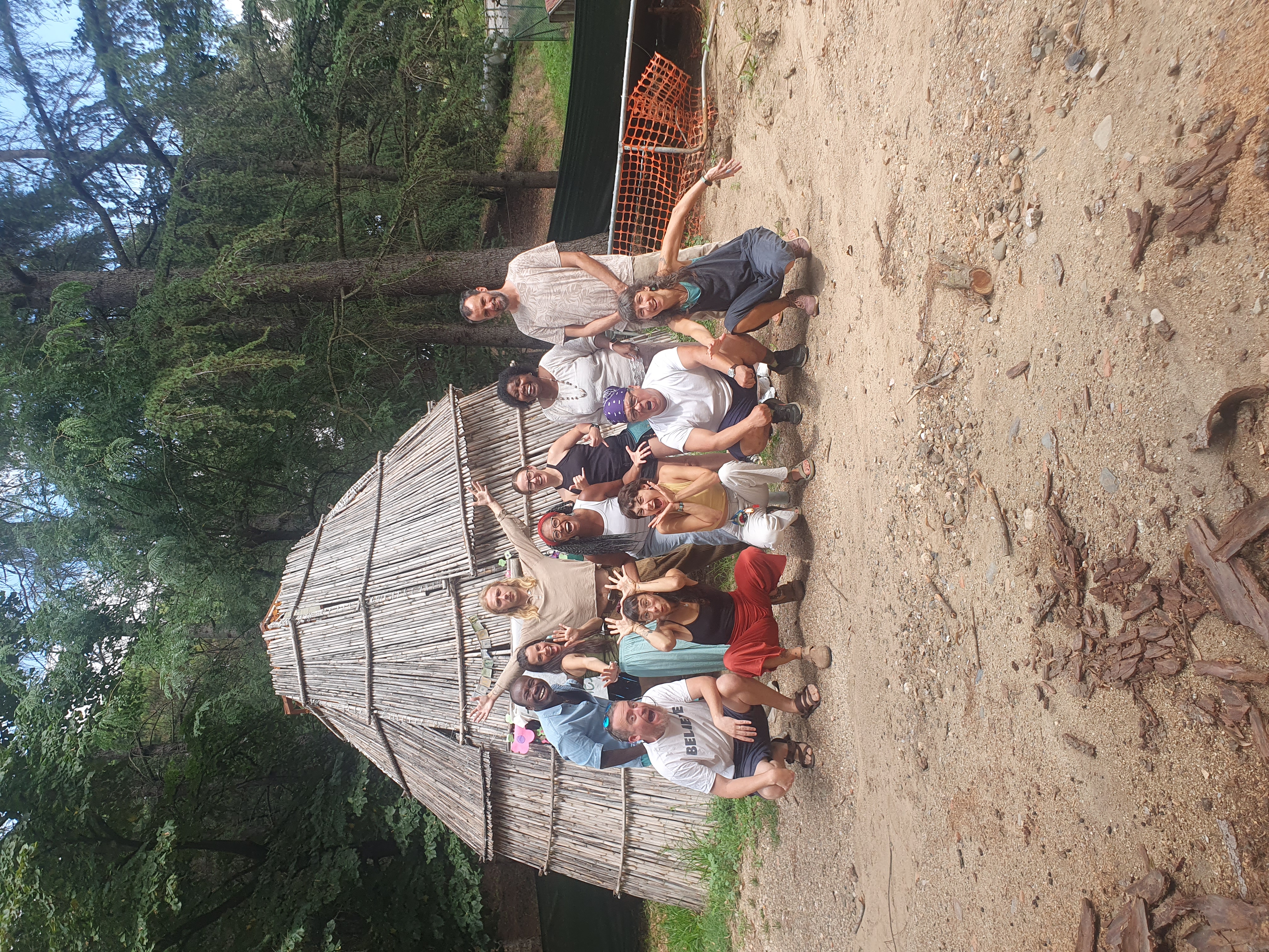 A teacher working with students outdoors